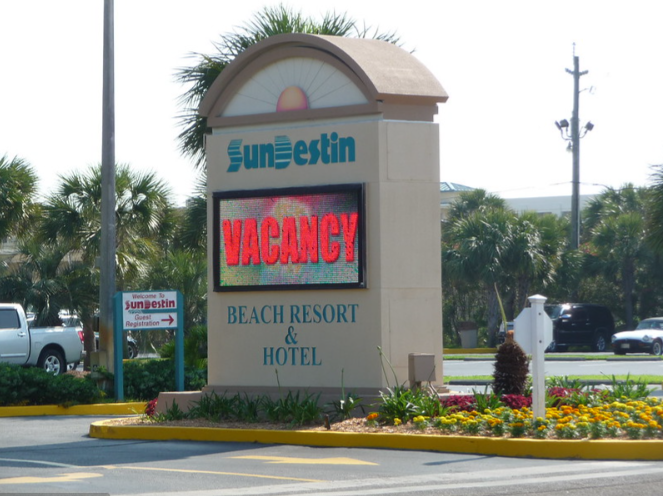 Entrance sign at SunDestin Beach Resort & Hotel / Flickr / WCities
Link: https://flickr.com/photos/wcities/4596978822/