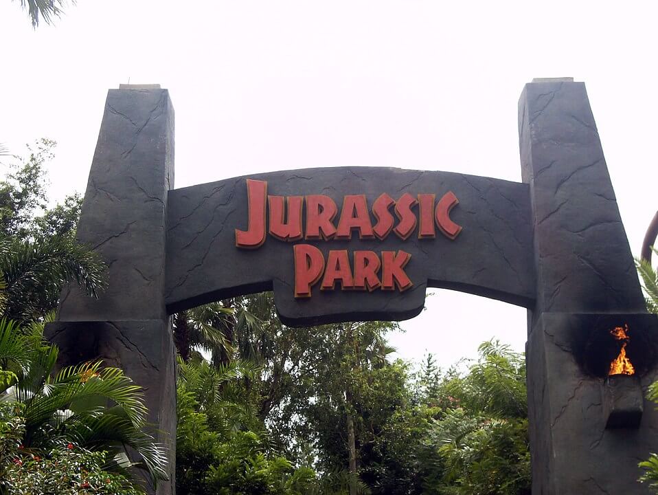 Entrance to Camp Jurassic / Wikipedia / Milpass93 https://en.wikipedia.org/wiki/Universal%27s_Islands_of_Adventure#/media/File:Jurassic_Park_Entrance_Arch_at_the_Universal_Islands_of_Adventure.JPG