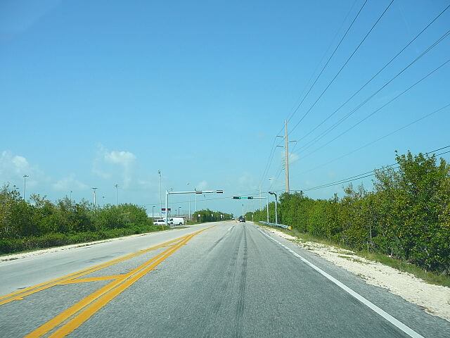 Empty Road on Upper Sugarloaf Key / Wikipedia / Marc Averette
Link: 
https://en.wikipedia.org/wiki/Upper_Sugarloaf_Key#/media/File:Sugarloaf_Key.jpg