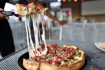 Rosati's Pizza / Flickr / Bites N Sites
Link: https://flic.kr/p/2jJXNQS 
